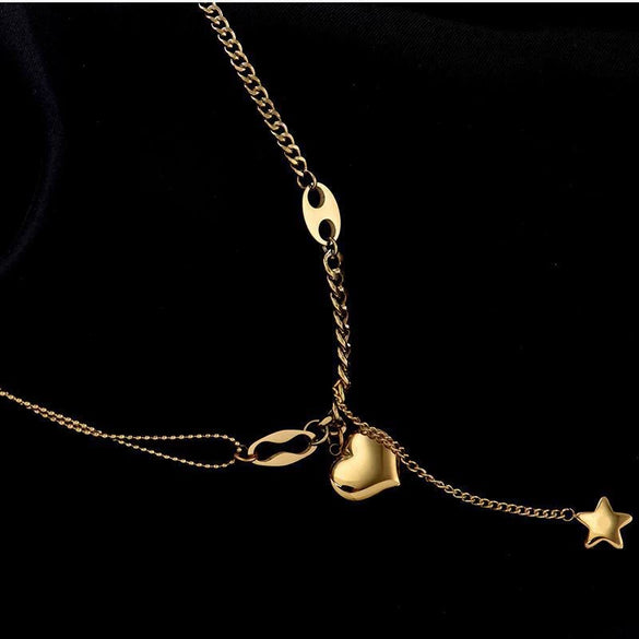 Wholesale Hiphop Threedimensional Peach Heart Titanium Steel Necklace With Fivepointed Star Tassel And Electroplating Treatment For Women
