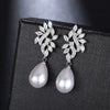 Wholesale Imitation Pearl Copper Geometric Dropshaped Microinlaid Zircon Highend Women's Earrings