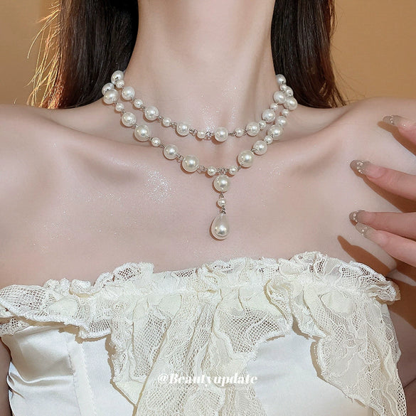 Wholesale Imitation Pearl Water Drop Love Bell French Retro Clavicle Chain Necklace And Earrings Set With Pearls
