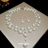 Wholesale Imitation Pearl Water Drop Love Bell French Retro Clavicle Chain Necklace And Earrings Set With Pearls