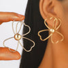 Wholesale Iron Flower Hollow Electroplated Women's Earrings