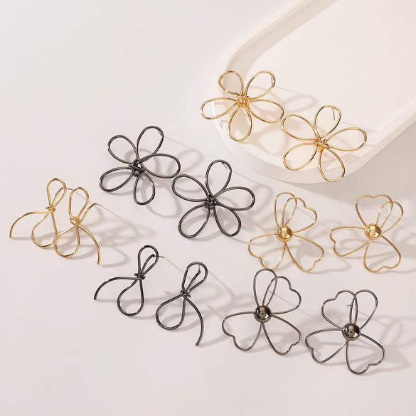 Wholesale Iron Flower Hollow Electroplated Women's Earrings