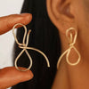 Wholesale Iron Flower Hollow Electroplated Women's Earrings
