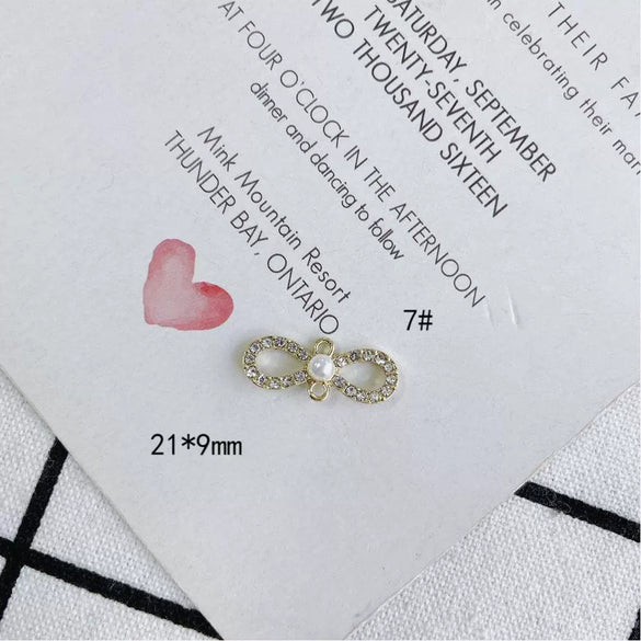Wholesale Jewelry Accessories Alloy Bow Pendant Electroplated For Earrings Necklaces And Bracelets