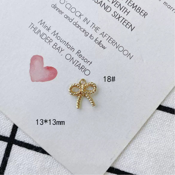 Wholesale Jewelry Accessories Alloy Bow Pendant Electroplated For Earrings Necklaces And Bracelets