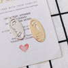Wholesale Jewelry Accessories Alloy Electroplated Abstract Face Pendant Earrings