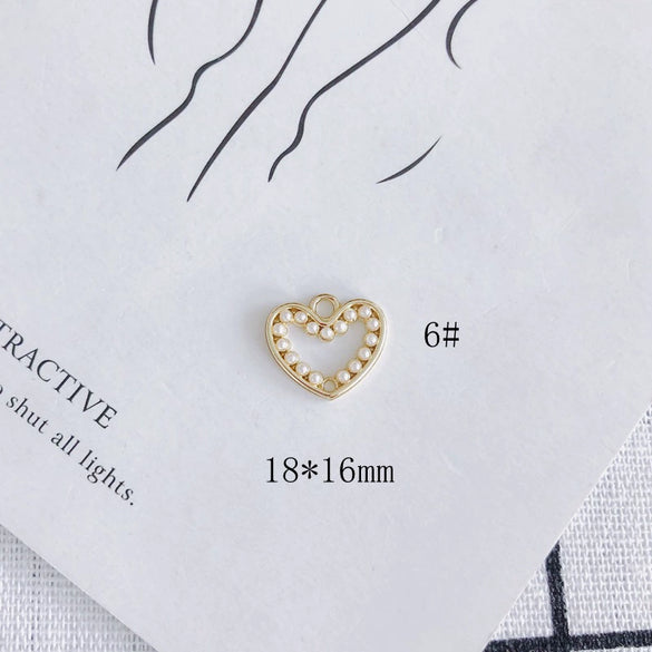 Wholesale Jewelry Accessories Alloy Geometric Shape Inlaid Pearl Electroplating Small Pendant Earrings