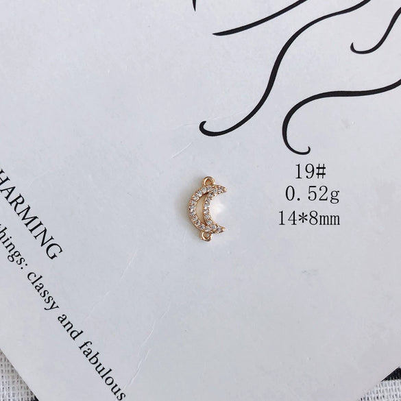 Wholesale Jewelry Accessories Copper And Zircon Inlaid Love Moon Wings Cross Pendant