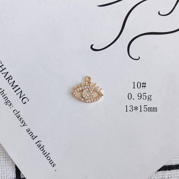 Wholesale Jewelry Accessories Copper And Zircon Inlaid Love Moon Wings Cross Pendant