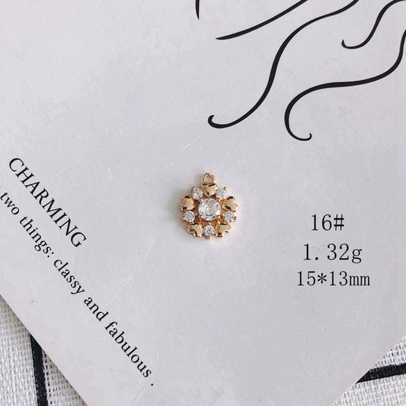 Wholesale Jewelry Accessories Copper Zircon Inlaid Star Bow Four Leaf Clover Hollow Pendant