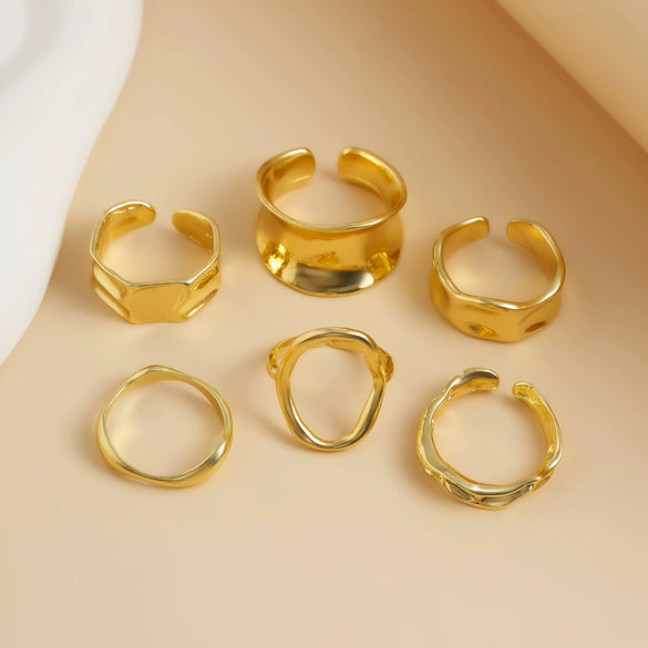 Wholesale Jewelry Alloy Geometric Hollow Pleated Ring And Irregular Cambered Bracelet Set With Electroplating