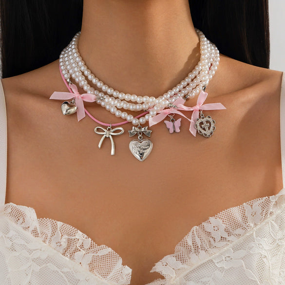 Wholesale Jewelry Alloy Pendant Necklace With Imitation Pearl Beaded Chain Electroplated Heart Shape Cute Style For Women
