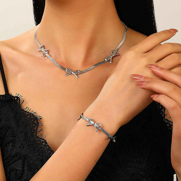 Wholesale Jewelry Bow Stainless Steel Imitation Pearls Electroplated Snake Bone Chain Earrings Bracelet Necklace Choker For Female