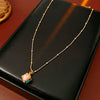 Wholesale Jewelry Cat's Eye Stone Copper Electroplated Heart Water Drop Bell Shaped Necklace And Earrings Set Highend Style
