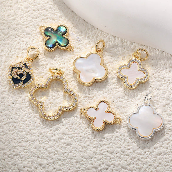 Wholesale Jewelry Copper Goldplated Sweet Style Flower Fourleaf Clover Pendant With Zircon Inlaid And Colorpreserving Abalone Shell Diy Jewelry Accessories Double Hole