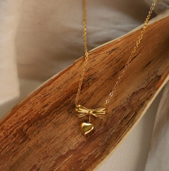 Wholesale Jewelry Elegant Classic Style Heart Shape Solid Color Bow Knot 304 Stainless Steel Titanium Steel 18K Gold Plated Pendant Necklace