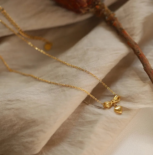 Wholesale Jewelry Elegant Classic Style Heart Shape Solid Color Bow Knot 304 Stainless Steel Titanium Steel 18K Gold Plated Pendant Necklace