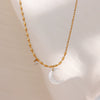 Wholesale Jewelry Fashion Geometric Stainless Steel Asymmetrical Rice Beads Shell Crescent Necklace With Electroplating Treatment For Women
