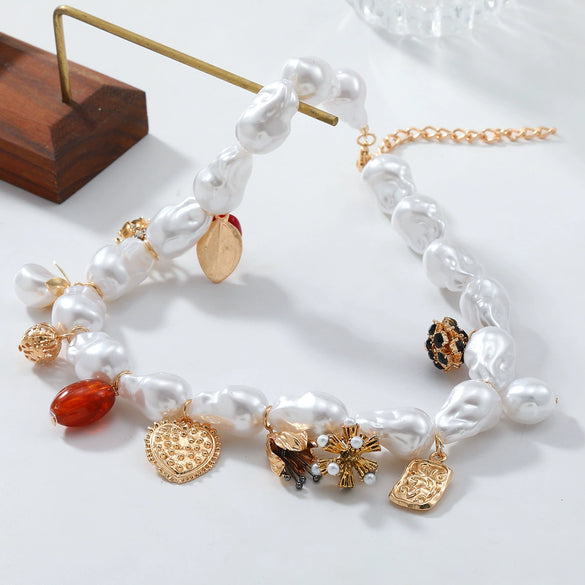 Wholesale Jewelry Imitation Pearl And Alloy Pendant Necklace With Heart Insect Leaves Geometric Pattern Electroplated