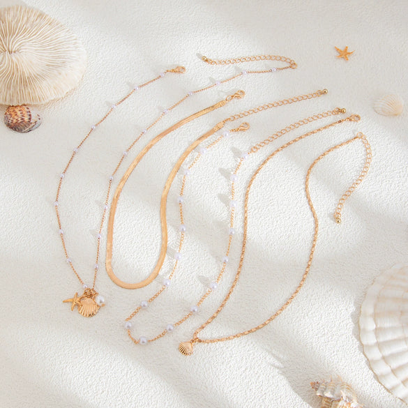 Wholesale Jewelry Metal Starfish Shell Imitation Pearl Necklace Copper Chain Alloy Pendant Electroplating Geometric Style