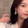 Wholesale Jewelry Modern Style Flower Alloy Asymmetrical Tassel Plating Drop Earrings