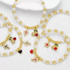 Wholesale Jewelry Pearl Beaded Cross Cherry Fruit Pendant Goldplated Copper Bracelet Unisex