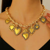 Wholesale Jewelry Retro Personality Sacred Heart Alloy Pendant Necklace And Earrings With Electroplating