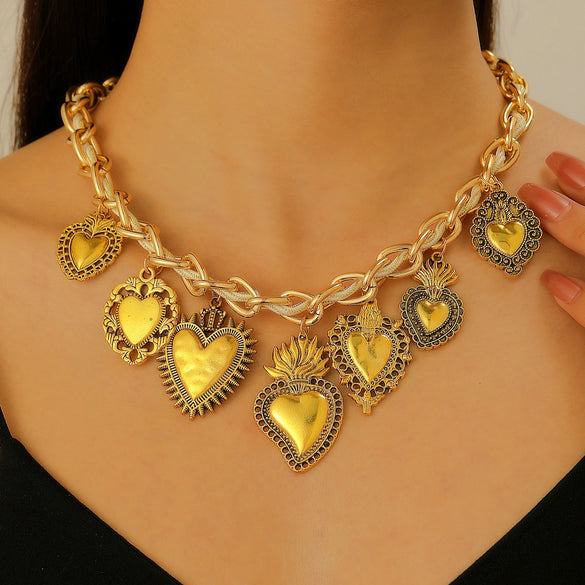 Wholesale Jewelry Retro Personality Sacred Heart Alloy Pendant Necklace And Earrings With Electroplating