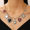 Wholesale Jewelry Retro Personality Sacred Heart Alloy Pendant Necklace And Earrings With Electroplating
