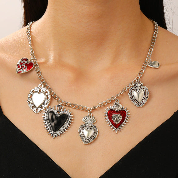 Wholesale Jewelry Retro Personality Sacred Heart Alloy Pendant Necklace And Earrings With Electroplating