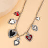 Wholesale Jewelry Retro Personality Sacred Heart Alloy Pendant Necklace And Earrings With Electroplating
