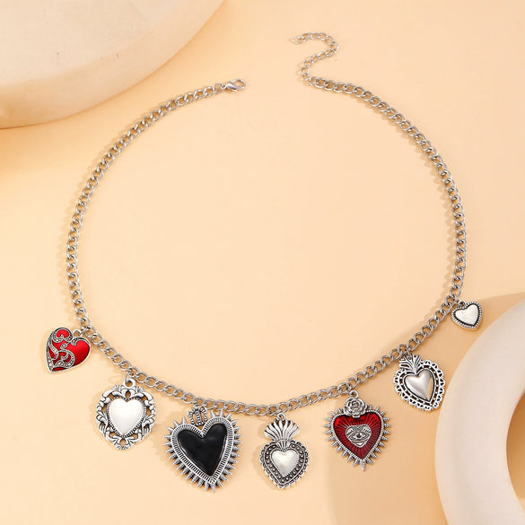 Wholesale Jewelry Retro Personality Sacred Heart Alloy Pendant Necklace And Earrings With Electroplating