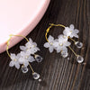 Wholesale Jewelry Retro Style Geometric Plastic And Resin Earrings Inlaid With Crystal Flowers