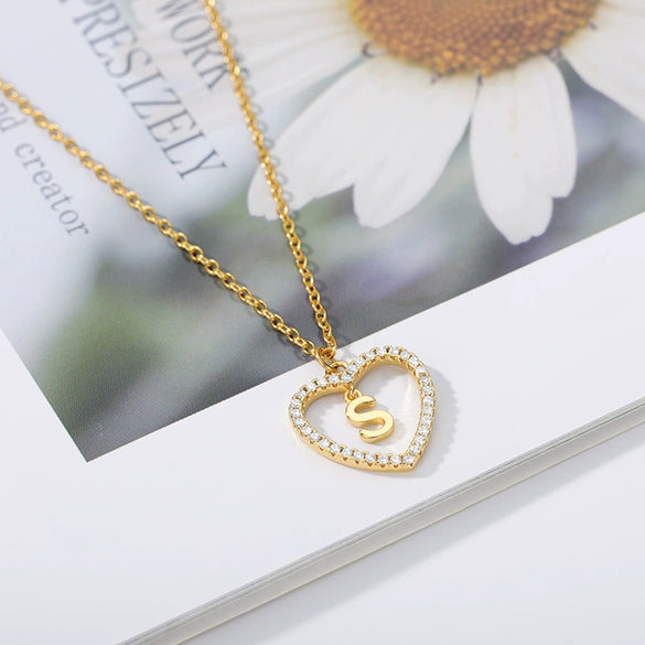 Wholesale Jewelry Simple Geometric Love Hollow Heart Pendant With 26 Letters Copper Zircon Pendant And Stainless Steel Ochain Electroplating Treatment