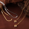 Wholesale Jewelry Simple Style 316L Stainless Steel Blade Chain Fourleaf Clover Inlaid Zircon Pendant Goldplated Necklace With Geometric Pattern