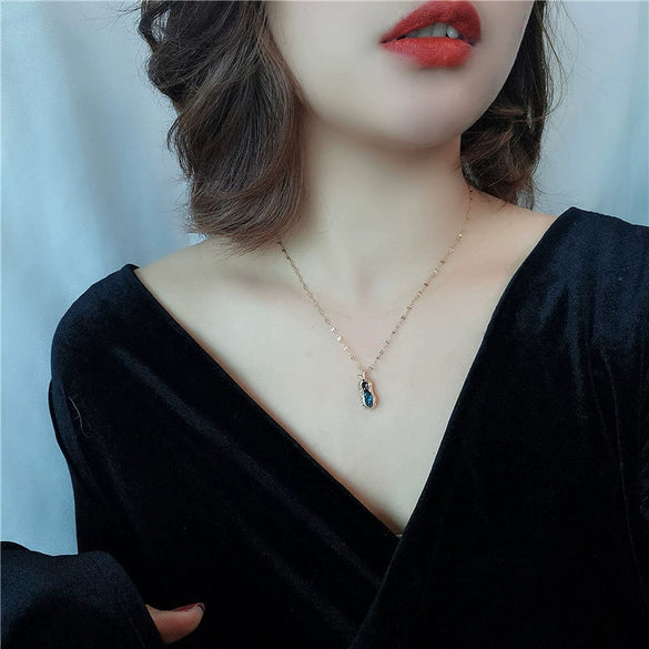 Wholesale Jewelry Titanium Steel Copper Peanut Shaped Sapphire Two Color Geometric Simple Design Necklace For Women