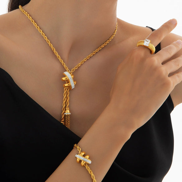 Wholesale Jewelry Titanium Steel Geometric Pattern Tassel Design Electroplated Fourpiece Set Necklace Bracelet Earrings Ring