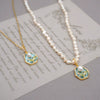 Wholesale Jewelry Vintage Style Geometric Flower Alloy Pendant Necklace Inlaid With Freshwater Pearls And Cross Chain
