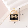 Wholesale Jewelry Zinc Alloy Love Bow Pendant Accessories With Hirback Pattern And Dripping Oil Design For Women