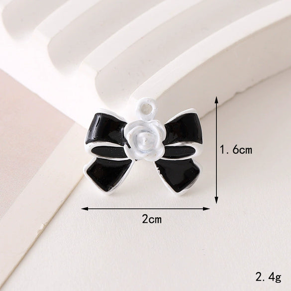 Wholesale Jewelry Zinc Alloy Love Bow Pendant Accessories With Hirback Pattern And Dripping Oil Design For Women