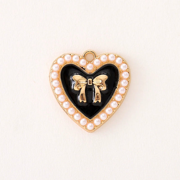 Wholesale Jewelry Zinc Alloy Love Bow Pendant Accessories With Hirback Pattern And Dripping Oil Design For Women