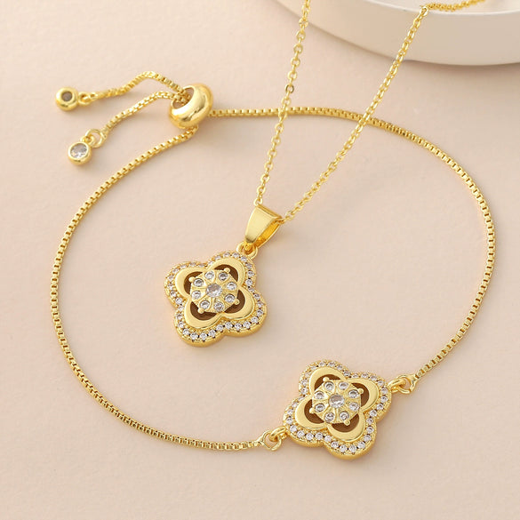 Wholesale 18K Gold Plated Copper Diamondencrusted Fourleaf Clover Necklace And Bracelet Jewelry Set For Women