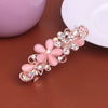 Wholesale Ladies Alloy Flower Rhinestone Cat's Eye Top Clip Hairpin Jewelry With Electroplating