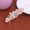 Wholesale Ladies Alloy Flower Rhinestone Cat's Eye Top Clip Hairpin Jewelry With Electroplating