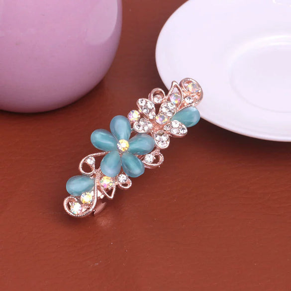 Wholesale Ladies Alloy Flower Rhinestone Cat's Eye Top Clip Hairpin Jewelry With Electroplating
