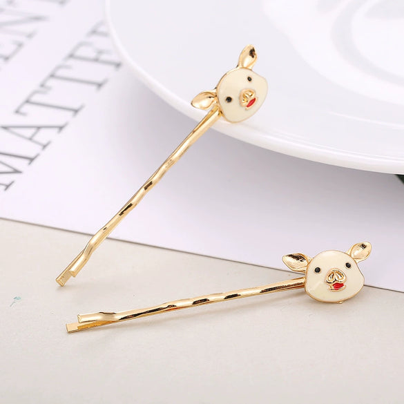 Wholesale Ladies Fashion Alloy Hair Clips In Cartoon Style With Piglet Design And Electroplating Treatment