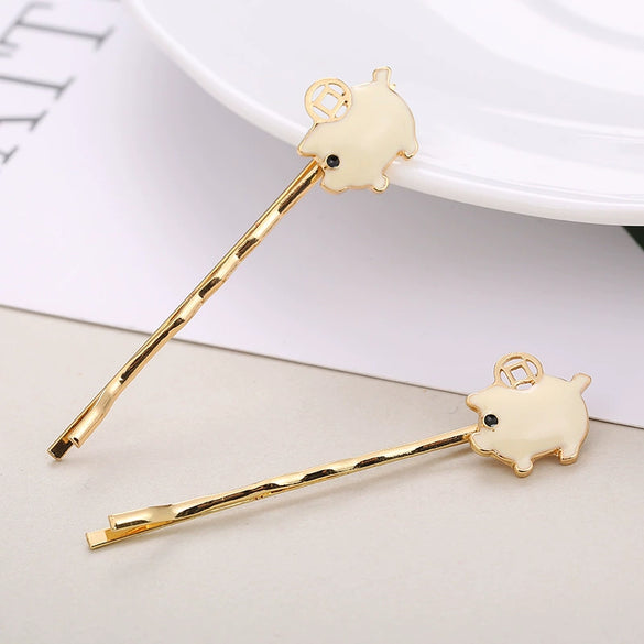 Wholesale Ladies Fashion Alloy Hair Clips In Cartoon Style With Piglet Design And Electroplating Treatment