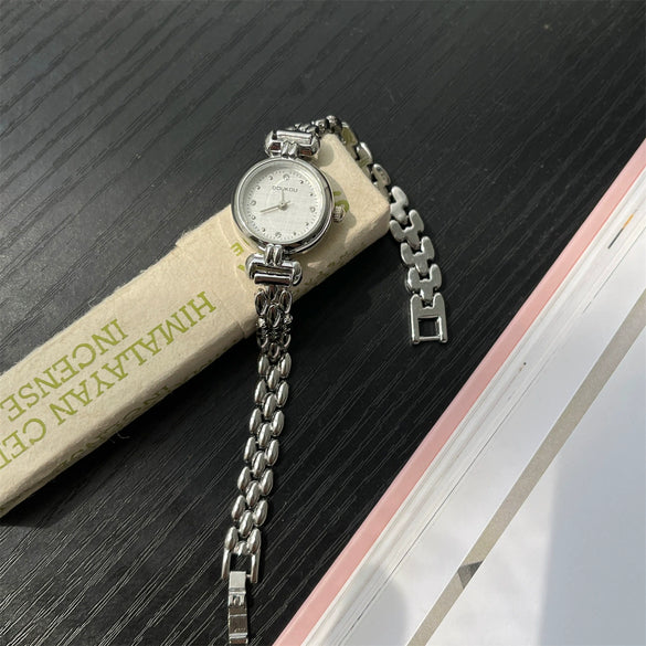 Wholesale Ladies Fashion Round Quartz Watch With Alloy Case And Strap