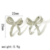 Wholesale Ladies Light Luxury Highend Bow Titanium Steel Electroplated Earrings