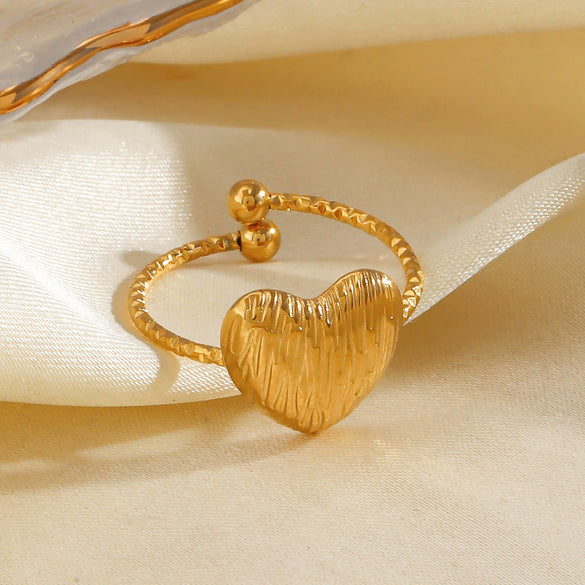 Wholesale Lady's Stainless Steel And Titanium Steel Geometric Heartshaped Ring With Gold Electroplating